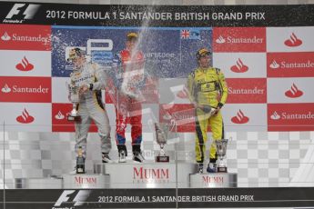 © 2012 Octane Photographic Ltd. British GP Silverstone - Sunday 8th July 2012 - GP2 Race 2 - Davide Valsecchi, Luiz Razia and Felipe Nasr spray champagne on the podium. Digital Ref : 0401lw7d7658