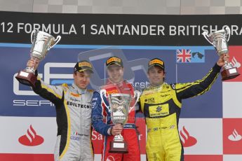 © 2012 Octane Photographic Ltd. British GP Silverstone - Sunday 8th July 2012 - GP2 Race 2 - Davide Valsecchi, Luiz Razia and Felipe Nasr rais their trophies on the podium. Digital Ref : 0401lw7d7688