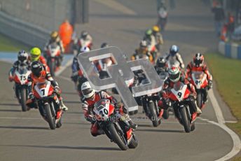 © Octane Photographic Ltd. Thundersport – Donington Park - 24th March 2012. Aprillia RRV450GP Challenge, CHARGE!!! The pack leaves the pitlane. Digital ref : 0259cb7d3182