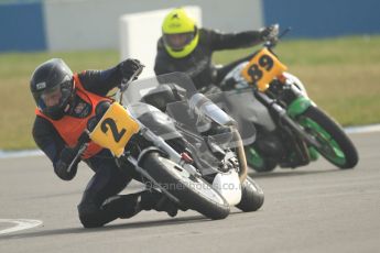 © Octane Photographic Ltd. Thundersport – Donington Park -  24th March 2012. Bridgestone Thundersport 500, James Butcher and Ian Robinson. Digital ref : 0256cb7d2537