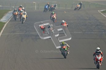© Octane Photographic Ltd. Thundersport – Donington Park - 24th March 2012. Morello Services Thundersport GP1 / Superstock 1000, the pack heading over the start finish line. Digital ref : 0258cb7d2919