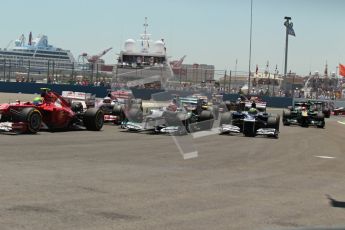 © 2012 Octane Photographic Ltd. European GP Valencia - Sunday 24th June 2012 - F1 Race. The pack gets underway. Digital Ref : 0374lw1d6913