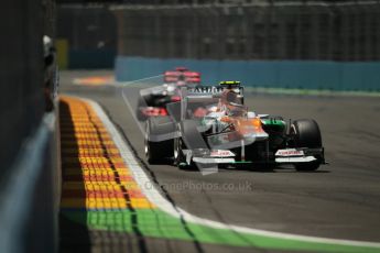 © 2012 Octane Photographic Ltd. European GP Valencia - Sunday 24th June 2012 - F1 Race. Force India VJM05 - Nico Hulkenberg and the McLaren MP4/27 of Jenson Button through his heat haze. Digital Ref : 0374lw1d7381