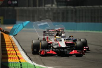 © 2012 Octane Photographic Ltd. European GP Valencia - Sunday 24th June 2012 - F1 Race. HRT F112 - Pedro de La Rosa getting lapped by the Red Bull RB8 of Sebastian Vettel. Digital Ref : 0374lw1d7459