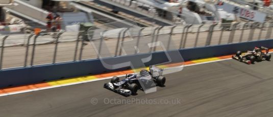 © 2012 Octane Photographic Ltd. European GP Valencia - Sunday 24th June 2012 - F1 Race. Williams FW34 - Pastor Maldonado and Lotus E20 - Kimi Raikkonen. Digital Ref : 0374lw7d3105