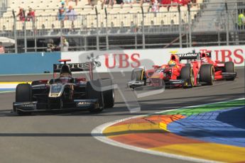 © 2012 Octane Photographic Ltd. European GP Valencia - Sunday 24th June 2012 - GP2 Race 2 - Lotus GP - James Calado heads Rio Haryanto's Carlin. Digital Ref : 0375lw1d6053