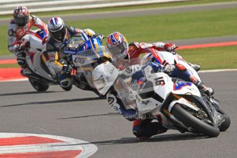 © Octane Photographic Ltd. World Superbike Championship – Silverstone, 2nd Free Practice. Saturday 4th August 2012. Leon Haslam leading the pack through Vale - BMW S1000 RR - BMW Motorrad Motorsport. Digital Ref : 0446cb7d1685