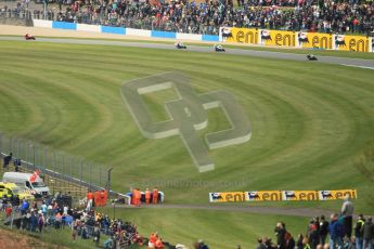 © Octane Photographic Ltd 2012. World Superbike Championship – European GP – Donington Park, Sunday 13th May 2012. Race 1. The pack charges through the famous Craner Curves and the huge crowd cheers them on. Digital Ref : 0335cb1d5187