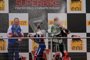 © Octane Photographic Ltd 2012. World Superbike Championship – European GP – Donington Park, Sunday 13th May 2012. Race 1 Podium. Marco Melandri and Tom Sykes spray their podium Champaign. Digital Ref : 0335lw7d7570