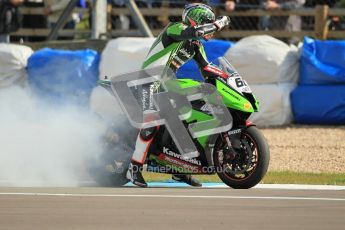 © Octane Photographic Ltd 2012. World Superbike Championship – European GP – Donington Park, Sunday 13th May 2012. Race 2. Tom Sykes performs a burnout for his fans. Digital Ref : 0337cb1d5903