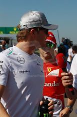 World © Octane Photographic Ltd. F1 USA GP, Austin, Texas, Circuit of the Americas (COTA), Sunday 17th November 2013 - Drivers' parade. Mercedes AMG Petronas F1 W04 - Nico Rosberg and Scuderia Ferrari F138 - Felipe Massa. Digital Ref : 0860lw1d2496