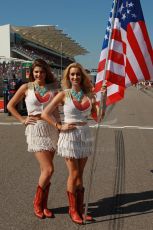World © Octane Photographic Ltd. F1 USA GP, Austin, Texas, Circuit of the Americas (COTA), Sunday 17th November 2013 - Grid. The grid girls with US Flag. Digital Ref : 0860lw1d2600
