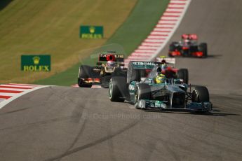 World © Octane Photographic Ltd. F1 USA GP, Austin, Texas, Circuit of the Americas (COTA), Sunday 17th November 2013 - Race. Mercedes AMG Petronas F1 W04 - Nico Rosberg and Lotus F1 Team E21 – Heikki Kovalainen. Digital Ref : 0861lw1d2844