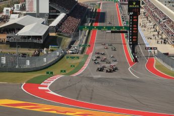 World © Octane Photographic Ltd. F1 USA GP, Austin, Texas, Circuit of the Americas (COTA), Sunday 17th November 2013 - Race. Infiniti Red Bull Racing RB9 - Sebastian Vettel leads the pack away on the opening lap. Digital Ref : 0861lw1d5888