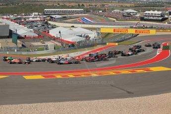 World © Octane Photographic Ltd. F1 USA GP, Austin, Texas, Circuit of the Americas (COTA), Sunday 17th November 2013 - Race. The pack safely heads around turn 1. Digital Ref : 0861lw1d5920