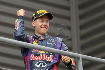 World © Octane Photographic Ltd. F1 Belgian GP - Spa-Francorchamps, Sunday 25th August 2013 - Podium. Infiniti Red Bull Racing RB9 - race winner Sebastian Vettel. Digital Ref : 0798lw1d0643