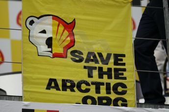 World © Octane Photographic Ltd. F1 Belgian GP - Spa-Francorchamps, Sunday 25th August 2013 - Podium. Anti Shell Arctic drill activists Greenpeace "Savethearctic.org" protesting on podium. Digital Ref : 0798lw1d0652