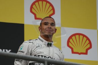 World © Octane Photographic Ltd. F1 Belgian GP - Spa-Francorchamps, Sunday 25th August 2013 - Podium. Mercedes AMG Petronas F1 W04 – Lewis Hamilton (3rd). Digital Ref : 0798lw1d0685