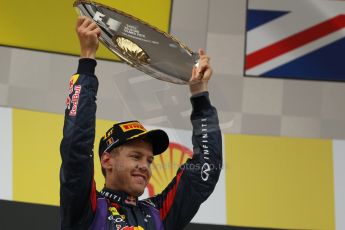 World © Octane Photographic Ltd. F1 Belgian GP - Spa-Francorchamps, Sunday 25th August 2013 - Podium. Infiniti Red Bull Racing RB9 - race winner Sebastian Vettel. Digital Ref : 0798lw1d0710