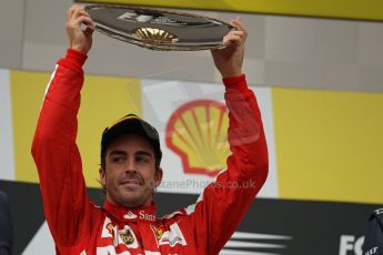 World © Octane Photographic Ltd. F1 Belgian GP - Spa-Francorchamps, Sunday 25th August 2013 - Podium. Scuderia Ferrari F138 - Fernando Alonso lifts his trophy for 2nd place. Digital Ref : 0798lw1d0739