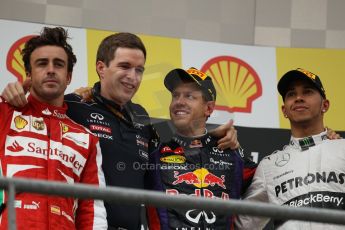 World © Octane Photographic Ltd. F1 Belgian GP - Spa-Francorchamps, Sunday 25th August 2013 - Podium. Infiniti Red Bull Racing RB9 - race winner Sebastian Vettel, Scuderia Ferrari F138 - Fernando Alonso. and Mercedes AMG Petronas F1 W04 – Lewis Hamilton on the podium. Digital Ref : 0798lw1d0815