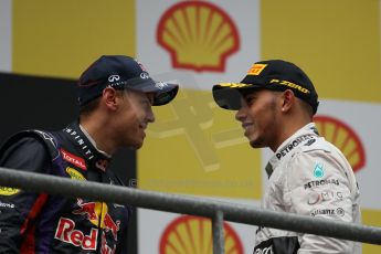 World © Octane Photographic Ltd. F1 Belgian GP - Spa-Francorchamps, Sunday 25th August 2013 - Podium. Infiniti Red Bull Racing RB9 - race winner Sebastian Vettel and Mercedes AMG Petronas F1 W04 – Lewis Hamilton. Digital Ref : 0798lw1d0859