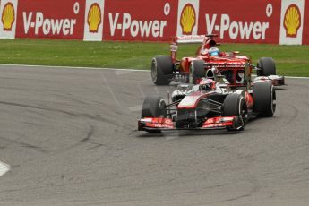 World © Octane Photographic Ltd. F1 Belgian GP - Spa-Francorchamps, Sunday 25th August 2013 - Race. Vodafone McLaren Mercedes MP4/28 - Jenson Button and Scuderia Ferrari F138 - Fernando Alonso. Digital Ref :