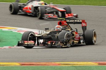 World © Octane Photographic Ltd. F1 Belgian GP - Spa-Francorchamps, Sunday 25th August 2013 - Race. Lotus F1 Team E21 - Romain Grosjean and Vodafone McLaren Mercedes MP4/28 - Sergio Perez. Digital Ref :