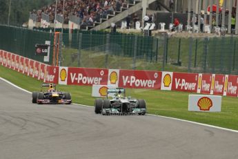 World © Octane Photographic Ltd. F1 Belgian GP - Spa-Francorchamps, Sunday 25th August 2013 - Race. Mercedes AMG Petronas F1 W04 - Nico Rosberg and Infiniti Red Bull Racing RB9 - Mark Webber. Digital Ref :