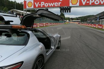 World © Octane Photographic Ltd. F1 Belgian GP - Spa-Francorchamps, Sunday 25th August 2013 - Race Build up. The Mercedes-Benz SLS safety car on the grid with La Source hairpin in the distance. Digital Ref :