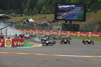 World © Octane Photographic Ltd. F1 Belgian GP - Spa-Francorchamps, Sunday 25th August 2013 - Race. Mercedes AMG Petronas F1 W04 – Lewis Hamilton leads the pack into turn 1. Digital Ref : 0797lw1d0705