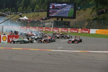 World © Octane Photographic Ltd. F1 Belgian GP - Spa-Francorchamps, Sunday 25th August 2013 - Race. Mercedes AMG Petronas F1 W04 – Lewis Hamilton leads the pack into turn 1 as his team mate Nico Rosberg grabs the front right brake. Digital Ref : 0797lw1d0708