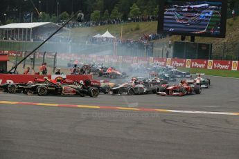 World © Octane Photographic Ltd. F1 Belgian GP - Spa-Francorchamps, Sunday 25th August 2013 - Race. The pack safely clears turn 1 on the opening lap. Digital Ref : 0797lw1d0722