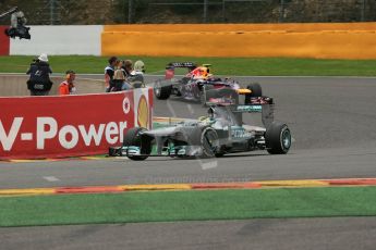 World © Octane Photographic Ltd. F1 Belgian GP - Spa-Francorchamps, Sunday 25th August 2013 - Race. Mercedes AMG Petronas F1 W04 - Nico Rosberg and Infiniti Red Bull Racing RB9 - Mark Webber. Digital Ref : 0797lw1d0825