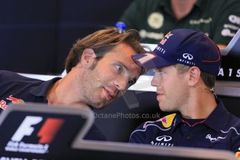 World © Octane Photographic Ltd. F1 Belgian GP - Spa - Francorchamps. Thursday 22nd August 2013. FIA Press Conference. Scuderia Toro Rosso STR8 - Jean-Eric Vergne talking with nfiniti Red Bull Racing driver Sebastian Vettel. Digital Ref : 0782lw1d6937