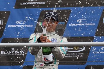 World © Octane Photographic Ltd. British Formula 3 – Brands Hatch. Saturday 10th August 2013 – Race 1. Race winner Jazeman Jaafar celebrates on the International Class podium – Carlin – Dallara F312 Volkswagen. Digital Ref : 0777lw7d1270