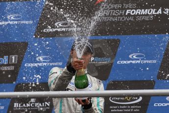 World © Octane Photographic Ltd. British Formula 3 – Brands Hatch. Saturday 10th August 2013 – Race 1. Race winner Jazeman Jaafar celebrates on the International Class podium – Carlin – Dallara F312 Volkswagen. Digital Ref : 0777lw7d1282