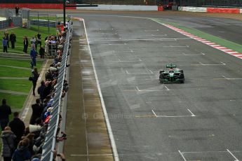 World © Octane Photographic Ltd./Carl Jones. Caterham F1 Team with Alexander Rossi demos at Silverstone, 20th October 2013. Digital Ref : 0845cj7d0108