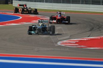 World © Octane Photographic Ltd. F1 USA GP - Austin, Texas, Circuit of the Americas (COTA), Friday 15th November 2013 - Practice 1. Mercedes AMG Petronas F1 W04 - Nico Rosberg, Scuderia Ferrari F138 - Fernando Alonso and Lotus F1 Team E21 – Heikki Kovalainen. Digital Ref : 0853lw1d2922