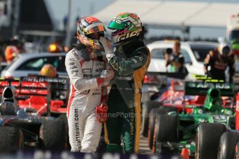 World © Octane Photographic Ltd. F1 USA GP, Austin, Texas, Circuit of the Americas (COTA), Sunday 17th November 2013 - Post-Race Parc Ferme. Caterham F1 Team - Giedo van der Garde and Marussia F1 Team - Jules Bianchi. Digital Ref : 0862lw1d6212