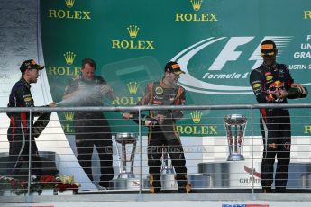 World © Octane Photographic Ltd. F1 USA GP, Austin, Texas, Circuit of the Americas (COTA), Sunday 17th November 2013 - Podium. Infiniti Red Bull Racing - Sebastian Vettel (1st), Lotus F1 Team - Romain Grosjean (2nd) and Infiniti Red Bull Racing - Mark Webber (3rd). Digital Ref : 0862lw1d6421