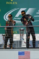 World © Octane Photographic Ltd. F1 USA GP, Austin, Texas, Circuit of the Americas (COTA), Sunday 17th November 2013 - Podium. Lotus F1 Team - Romain Grosjean (2nd) and Infiniti Red Bull Racing - Mark Webber (3rd). Digital Ref : 0862lw1d6432