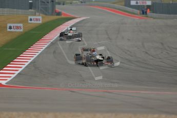 World © Octane Photographic Ltd. F1 USA GP, Austin, Texas, Circuit of the Americas (COTA), Saturday 16th November 2013 - Practice 3. Lotus F1 Team E21 - Romain Grosjean and Sauber C32 - Nico Hulkenberg. Digital Ref : 0857lw1d4659