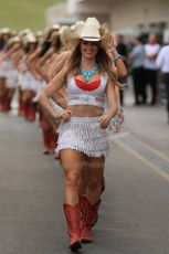World © Octane Photographic Ltd. F1 USA GP, Austin, Texas, Circuit of the Americas (COTA), Sunday 17th November 2013 - Paddock. The grid girls form up in position in the paddock. Digital Ref : 0859lw1d5572