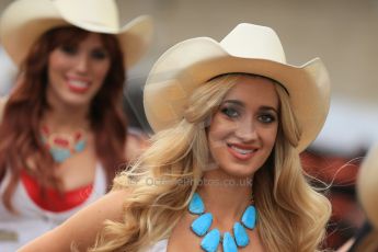 World © Octane Photographic Ltd. F1 USA GP, Austin, Texas, Circuit of the Americas (COTA), Sunday 17th November 2013 - Paddock. The grid girls form up in position in the paddock. Digital Ref : 0859lw1d5585