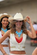 World © Octane Photographic Ltd. F1 USA GP, Austin, Texas, Circuit of the Americas (COTA), Sunday 17th November 2013 - Paddock. The grid girls form up in position in the paddock. Digital Ref : 0859lw1d5589
