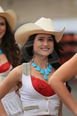 World © Octane Photographic Ltd. F1 USA GP, Austin, Texas, Circuit of the Americas (COTA), Sunday 17th November 2013 - Paddock. The grid girls form up in position in the paddock. Digital Ref : 0859lw1d5594
