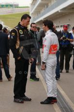 World © Octane Photographic Ltd. USA F1 Grand Prix, Austin, Texas, Circuit of the Americas (COTA). Paddock, Thursday 14th November 2013. Sergio Perez - Vodafone McLaren Mercedes and Federico Gastaldi - Lotus F1 Team's Business Development Director. Digital Ref : 0852lw1d1066