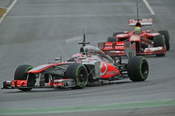 World © Octane Photographic Ltd. Formula 1 Winter testing, Barcelona – Circuit de Catalunya, 22nd February 2013. Vodafone McLaren Mercedes MP4/28. Jenson Button and Ferrari F138 – Felipe Massa. Digital Ref: 0579cb1d4560