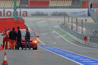 World © Octane Photographic Ltd. Formula 1 Winter testing, Barcelona – Circuit de Catalunya, 22nd February 2013. The recovery crew get ready to go and collect the Ferrari F138 of Felipe Massa that spun on its second lap. Digital Ref: 0579cb7d9317